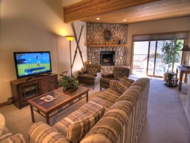 Living room with flat screen TV & fireplace Living room with flat screen TV & fireplace